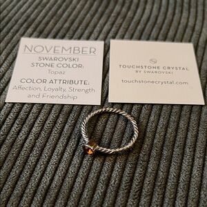 Touchstone Crystal Twisted Silver Ring with Topaz Accent